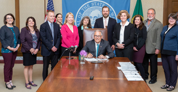 photo of plastic packaging bill signing ceremony